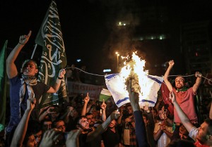 Islamists burn an Israeli flag outside the Israeli consulate in Ankara.  /AP