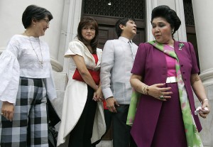 Imelda Marcos, right, with her children at the Supreme Court in Manila. / Aaron Favila / AP