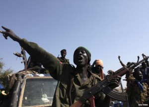 South Sudan soldiers celebrate after recapturing Bentiu on Jan. 12.  /Reuters