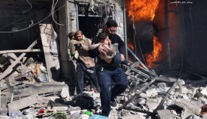 Syrian men help survivors out of a destroyed building after a Syrian forces warplanes attacked in Aleppo on Feb. 8. /Aleppo Media Center/AP