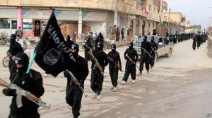 Fighters from the al-Qaida linked Islamic State of Iraq and the Levant (ISIL) marching in Raqqa, Syria. /AP