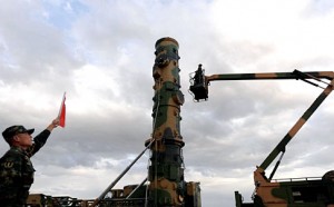 PLA Daily published first photos of members of the Second Artillery Forces preparing a Dongfeng-31 missile.  /SCMP
