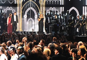Queen Latifah and musicians perform onstage as 30 couples are married during the 56th GRAMMY Awards at Staples Center on Jan. 26, in Los Angeles. / Kevork Djansezian / Getty Images