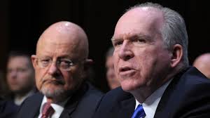 CIA Director John Brennan, right, accompanied by Director of National Intelligence James Clapper.  /AP/Susan Walsh