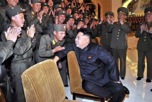 N. Korea's Kim Jong Un with Korean People's Army (KPA) officers after their performance at the 36th KPA Art Festival in Pyongyang on Oct. 28, 2013.  /AFP