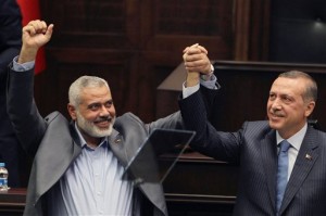 Turkish Prime Minister Recep Erdogan, right, with Hamas Prime Minister Ismail Haniyeh. /AP