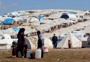 Syrian refugees at the Atmeh refugee camp, in northern Syria in April 2013. /VOA/AP