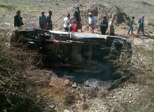 Yemenis look at a pickup truck after it was allegedly hit by a U.S. drone in Yemen's al-Bayda province on April 19.  /EPA