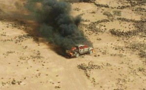 This aerial photo shows a truck burning after a Jordanian air strike on a convoy at the border between Jordan and Syria on Wednesday, April 16.  /AP