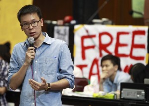 Student leader Lin Fei-fan speaks in Taiwan’s parliament during the ongoing protests opposing the controversial trade agreement with China, on April 5. / Reuters