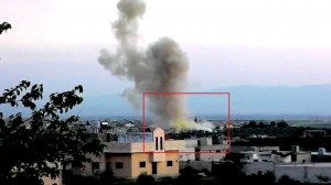 Screenot from a video posted to YouTube on April 11, 2014 shows substantial yellow coloration at base of the cloud over Keferzita, Syria, drifting with main cloud, and color intensity appears to quickly dissipate over next 20 seconds.  /Human Rights Watch