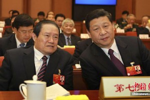 Zhou Yongkang, left, and Xi Jinping