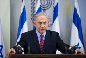 Israeli Prime Minister Benjamin Netanyahu speaks to the media in Tel Aviv on June 15.  /AP/Dan Balilty
