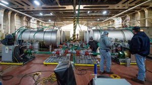 Contractors work on the hydrolysis systems that are tasked with eliminating the Syrian chemical weapons. Image: Jim Watson/AFP/Getty Images