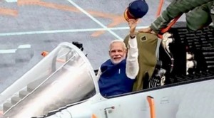 Indian Prime Minister Narendra Modi in jet fighter aboard the INS Vikramaditya.