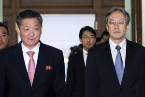North Korean chief delegate Song Il-Ho, left, and his Japanese counterpart Junichi Ihara arrive for talks in Stockholm, Sweden.  /AP