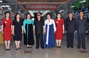 Photo released by North Korean state media on July 10, 2011 shows Kim Jong-Il at the Pyongyang Department Store No. 1. The woman who is second from left is believed by some to be his daughter Kim Sol-Song.  /Reuters/KCNA