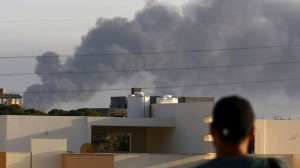 Smoke billows from an area near Tripoli's international airport on July 24.
