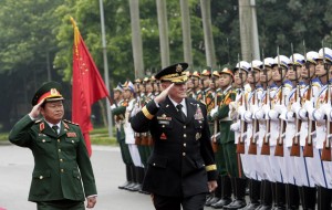 U.S. Chairman of the Joint Chiefs of Staff, Gen. Martin Dempsey and Vietnamese Chief of General Staff of the Army, Lt. Gen. Do Ba Ty in Hanoi, Vietnam on Aug. 14.  /Tran Van Minh/AP