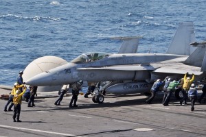 F/A-18C Hornets prepare for takeoff during operations aboard USS George H.W. Bush on Aug. 8.  /U.S. Navy photo by Mass Communication Specialist 3rd Class Lorelei Vander Griend
