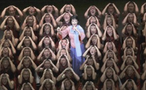 People's Liberation Army soldiers perform a musical drama as part of celebrations for the 60th anniversary of the founding of Communist China in August 2013.  /Reuters