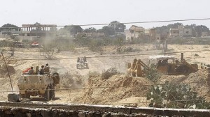 Egyptian forces destroy a smuggling tunnel.