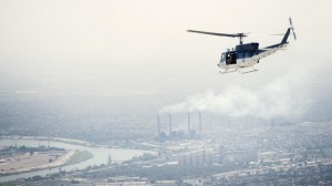 A US State Department helicopter flies over Baghdad on Sept. 10.  /AFP/Brendan Smialowski