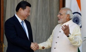 Indian Prime Minister Narendra Modi greets Chinese President Xi Jinping in New Delhi on Sept. 18.  /PTI