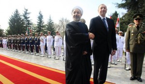 ... With an eye on Iran. Iran President Hassan Rouhani with Azerbaijani President Ilham Aliyev. /  IRNA