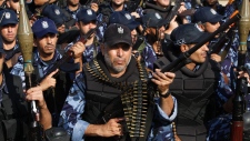 Palestinian security forces on parade in Gaza City.  / Adel Hana / AP 
