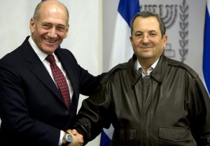 Former prime minister Ehud Olmert, left, and his then defense minister, Ehud Barak. / Reuters