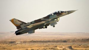 Israeli fighter jets strike arms convoy near northern border