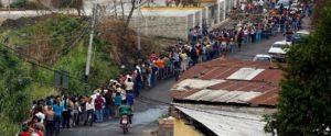 Long lines at grocery store in Venezuela.
