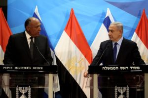 Israeli Prime Minister Benjamin Netanyahu (R) gives a joint statement with Egyptian Foreign Minister Sameh Shoukry prior to their meeting at his Jerusalem office on July 10. /AFP Photo/Gali Tibbon