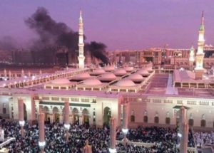 Smoke rises behind the Prophet's Mosque in Medina on July 4. /EPA/Saudi Press Agency