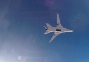 Image taken from video shows a Russian Tupolev Tu-22M3 long-range bomber based in Iran flying over an unknown location in Syria on Aug. 16 after dropping its payload. /Russian Defense Ministry