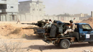 Pro-Libyan government forces fire on ISIL positions in Sirte. /Reuters