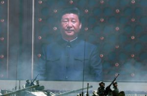 Making like Mao: Xi Jinping is said to be relying on two main weapons to ensure socio-political stability: upbeat propaganda and no-holds-barred crackdown on dissent. / Ng Han Guan / AP