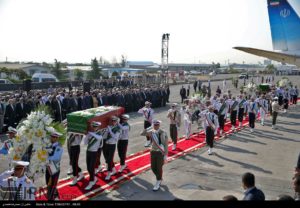 Iranian honor guard carries caskets of pilgrims, killed in a crush at the annual Hajj pilgrimage, on Oct. 3, 2015 at Tehran's Mehrabad Airport.