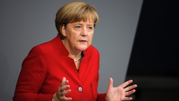 Report: Merkel pushes German firms to hire unqualified migrants