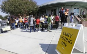 Voters line up during early voting at Chavis Community Center in Raleigh on Oct. 20. /AP