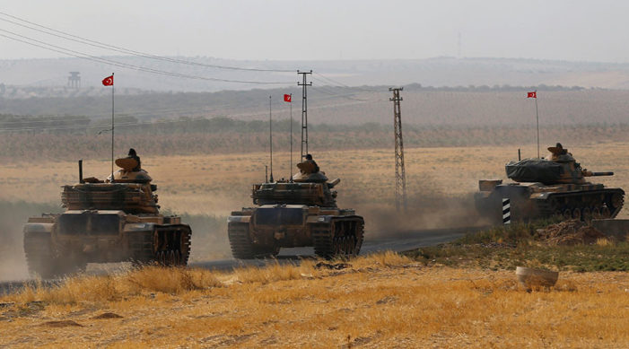 As Erdogan deploys tanks near border, Iraq warns Turkey will be treated ‘as an enemy’