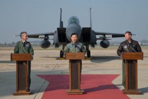 From left, UK Air Chief Marshal Sir Stephen Hillier, Republic of Korea Air Force commander Lt. Gen. Won In-Choul, and Lt. Gen Thomas W. Bergeson, 7th Air Force commander at Osan Air Base, ROK, Nov. 8, 2016. / U.S. Air Force photo by Senior Airman Dillian Bamman