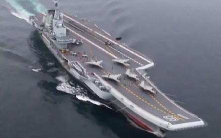 China’s carrier fleet passes near Taiwan in warning to U.S.