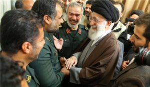 Iran’s Revolutionary Guards stand to reap huge economic rewards for helping Syria’s Assad