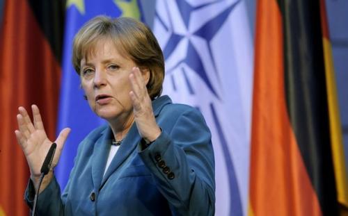 Merkel yields to Trump: Germany should meet defense spending obligation
