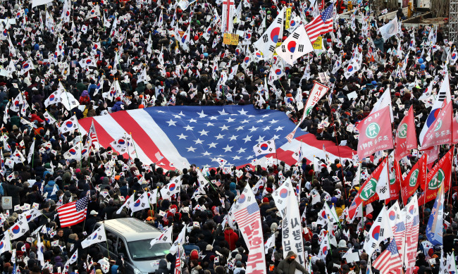 Cognitive dissonance in Seoul over the waving of American flags