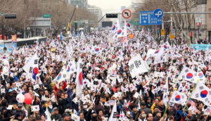 Mattis provides assurances against N. Korean threat as millions protest impeachment in Seoul
