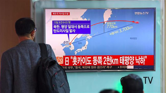 New, longest North Korea missile launch overflies Japan, puts Guam in range