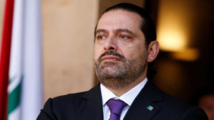 Back in Lebanon, Hariri says Iran-backed Hizbullah must accept reduced role